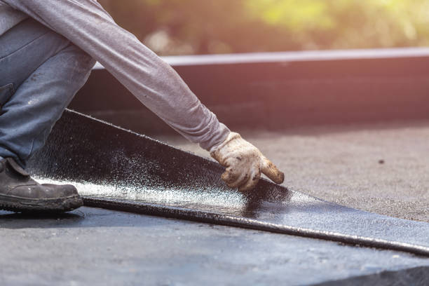 Professional Basement Waterproofing technician working in Hudson, NC